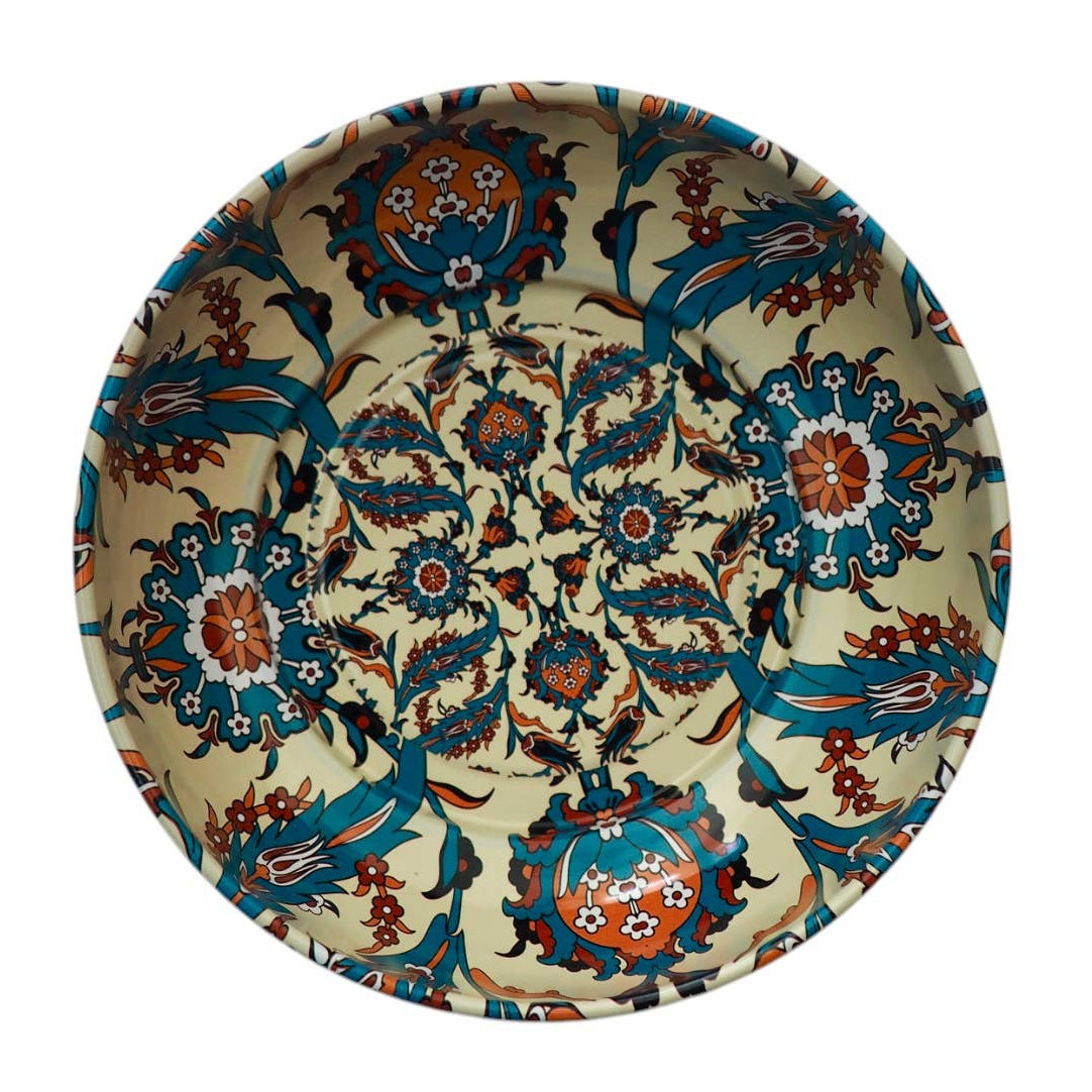 Decorative plate with intricate floral and geometric pattern on a white background