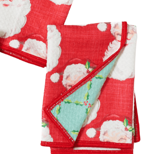Set of red napkins with Santa Claus pattern on a white background