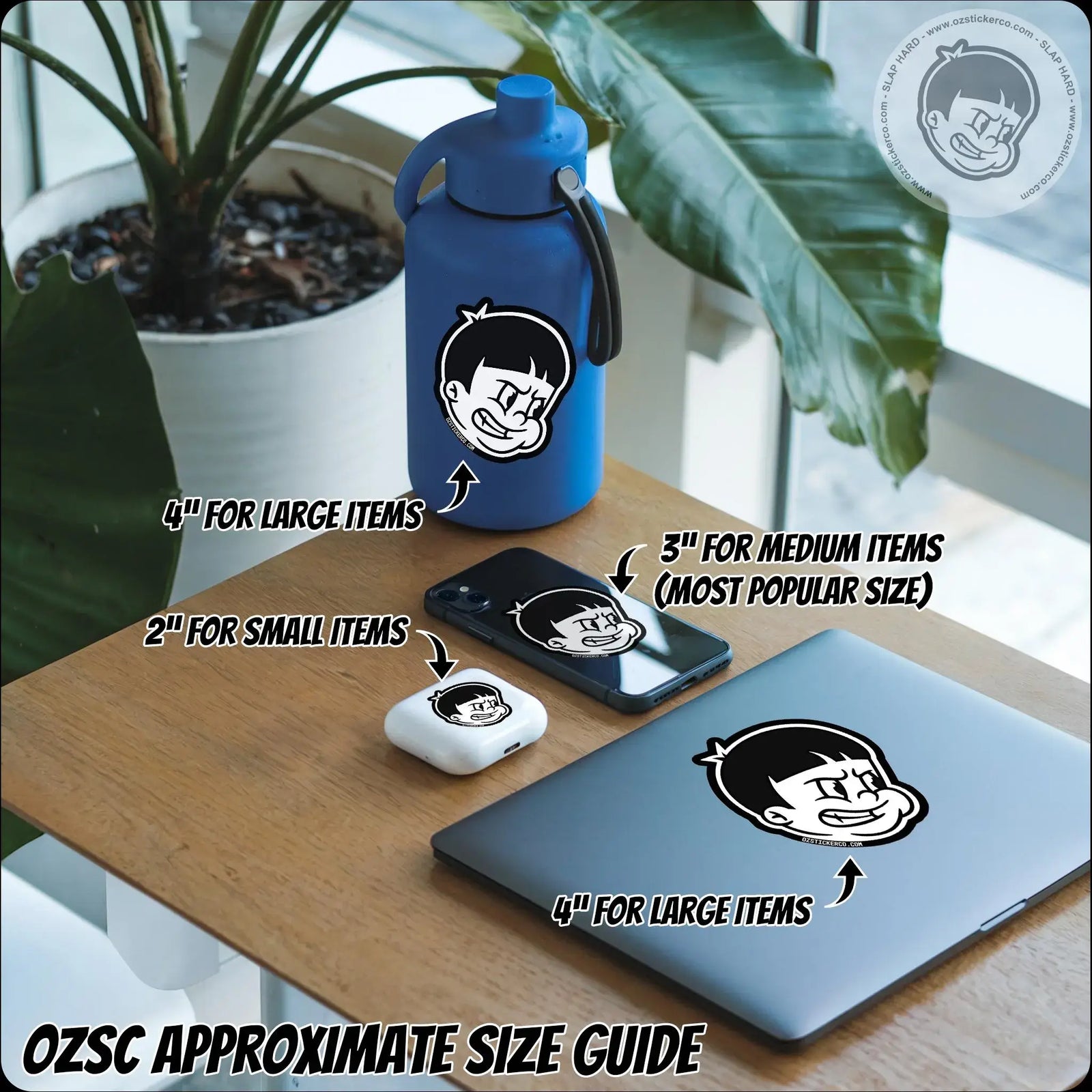 Two orange peel-shaped stickers on a wooden surface