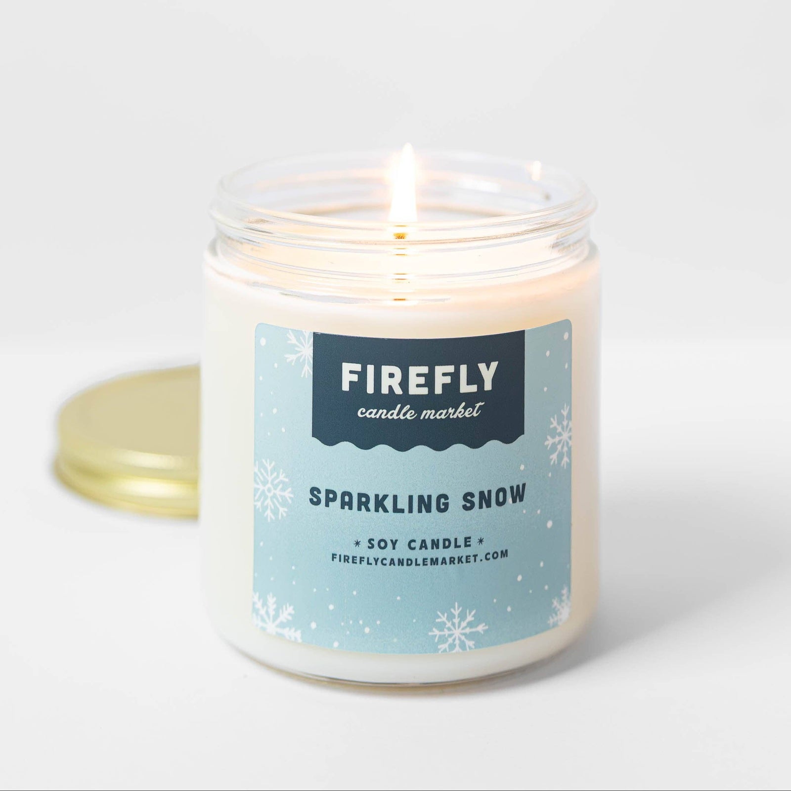 Firefly Candle Market Sparkling Snow candle on a white background