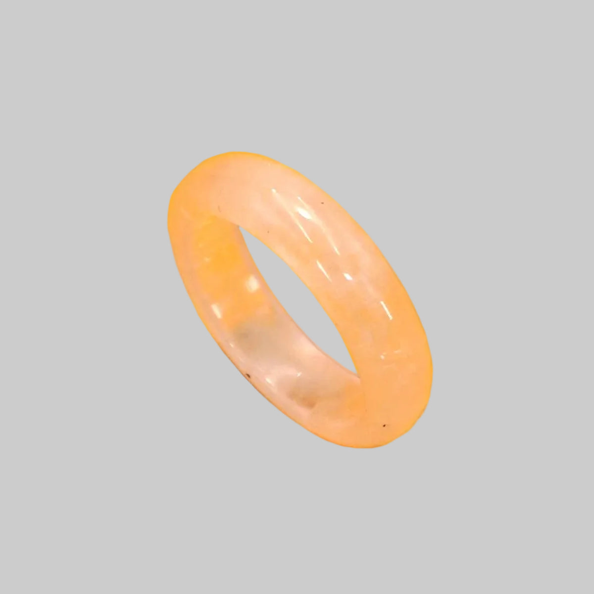 Pink ring on a yellow background