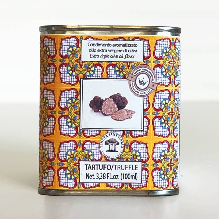 Tin can with decorative label featuring truffles on a white background