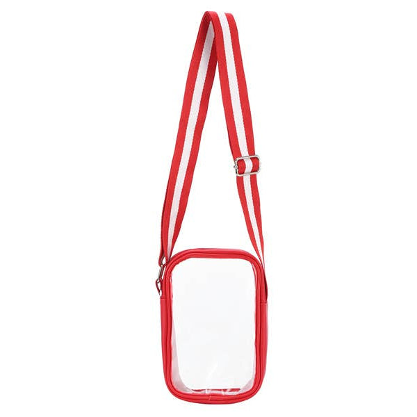 A clear plastic crossbody phone bag with a red trim and a red-and-white striped adjustable shoulder strap, shown against a plain white background.