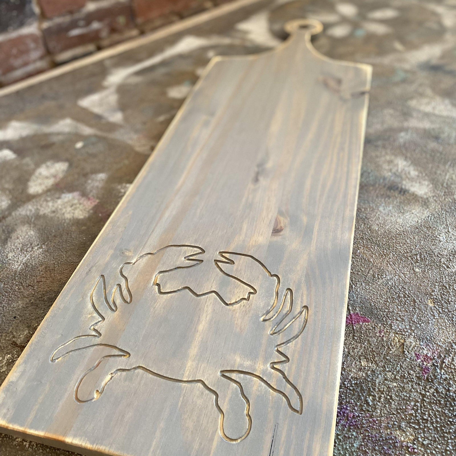 engraved crab charcuterie board grace graffiti
